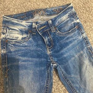 Buckle black distressed jeans